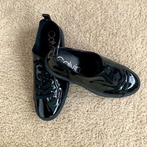 Black patent Calvin Klein sneakers